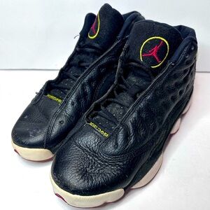Used Black Air Jordan 13 Sneakers with Red and Yellow Accents